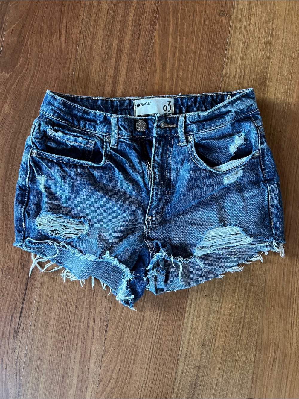Garage Women's Ripped Low Rise Medium Blue Denim Cutoff Shorts